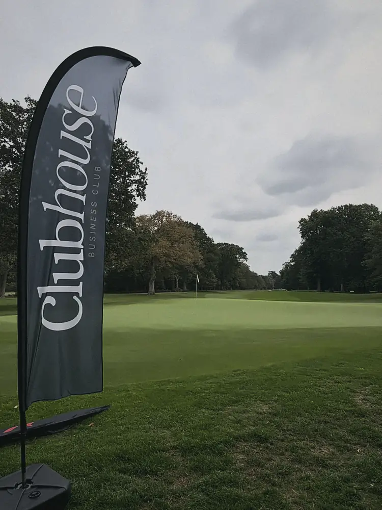 A single Clubhouse flag looking down the fairway at Woburn