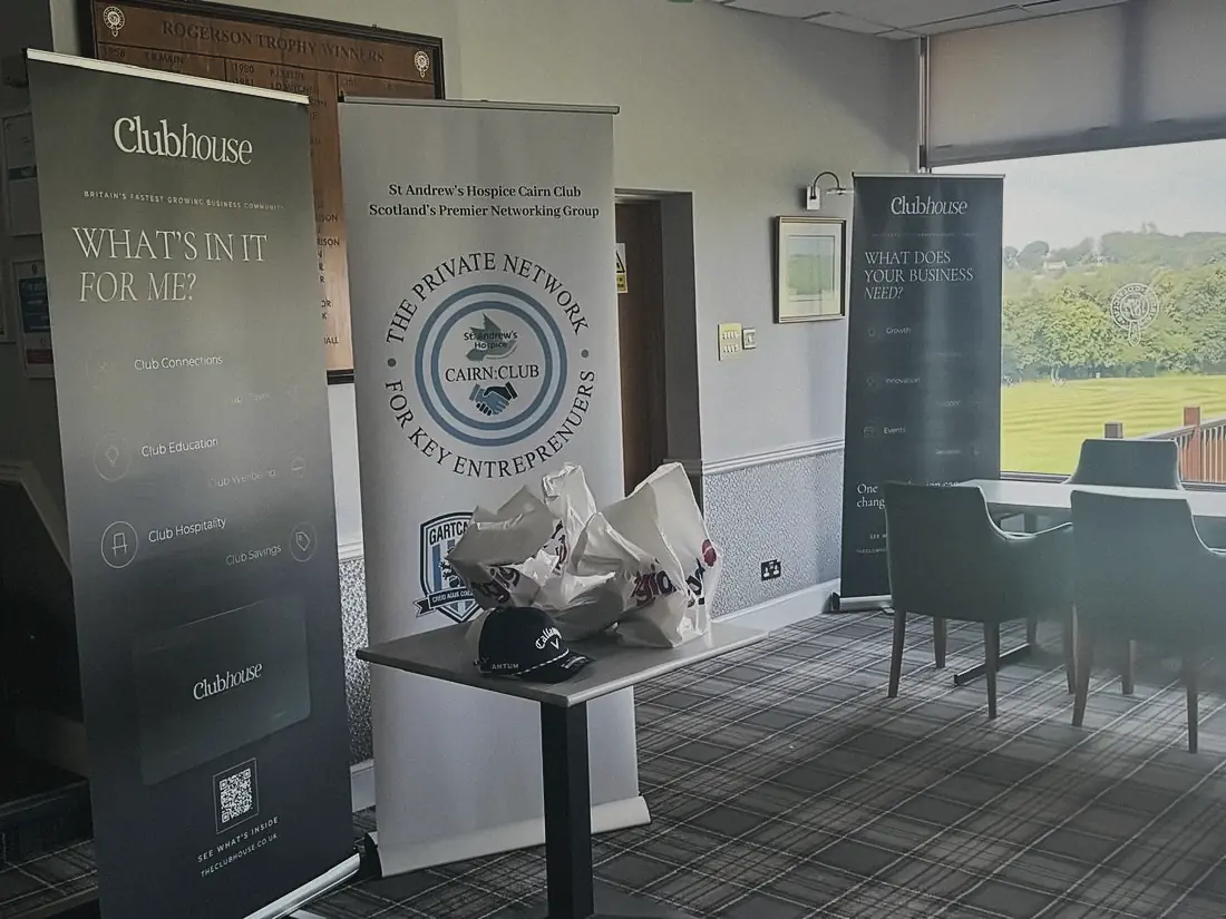 Clubhouse and Gartcairn FC banners inside the clubhouse