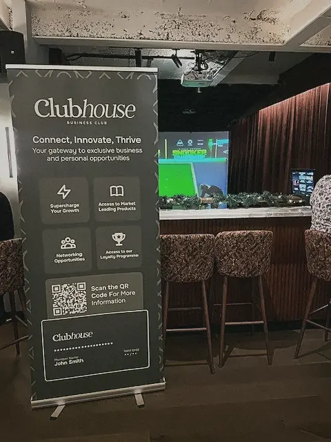 The Clubhouse pop-up banner by the bar